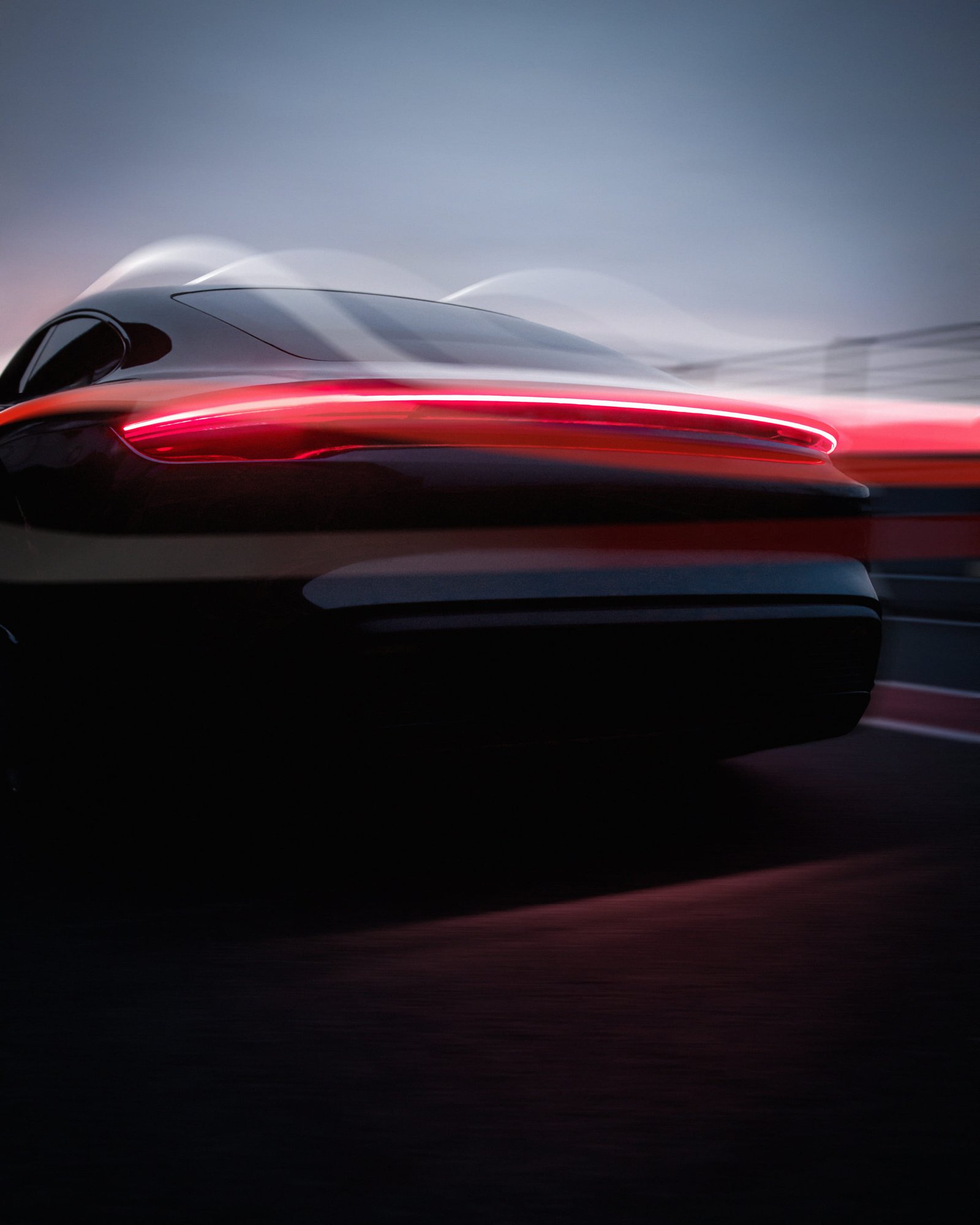 fast-red-car-road-back-view (1)